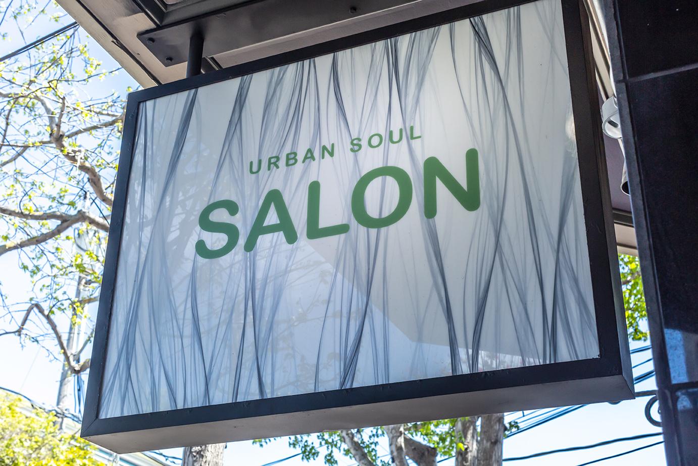 I designed the hair salon's new logo and created the outdoor signs and other printed materials.