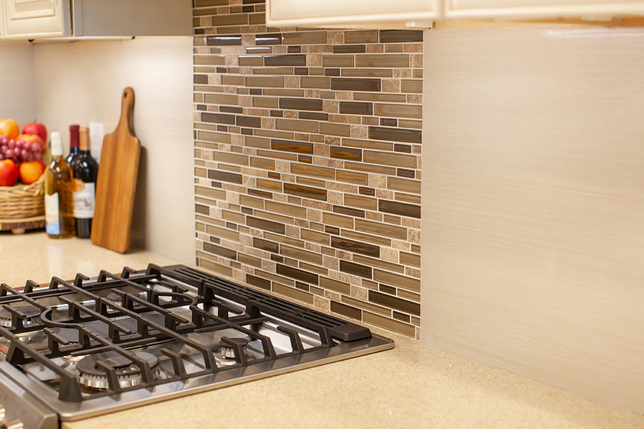 Close up of new stove and backsplashes