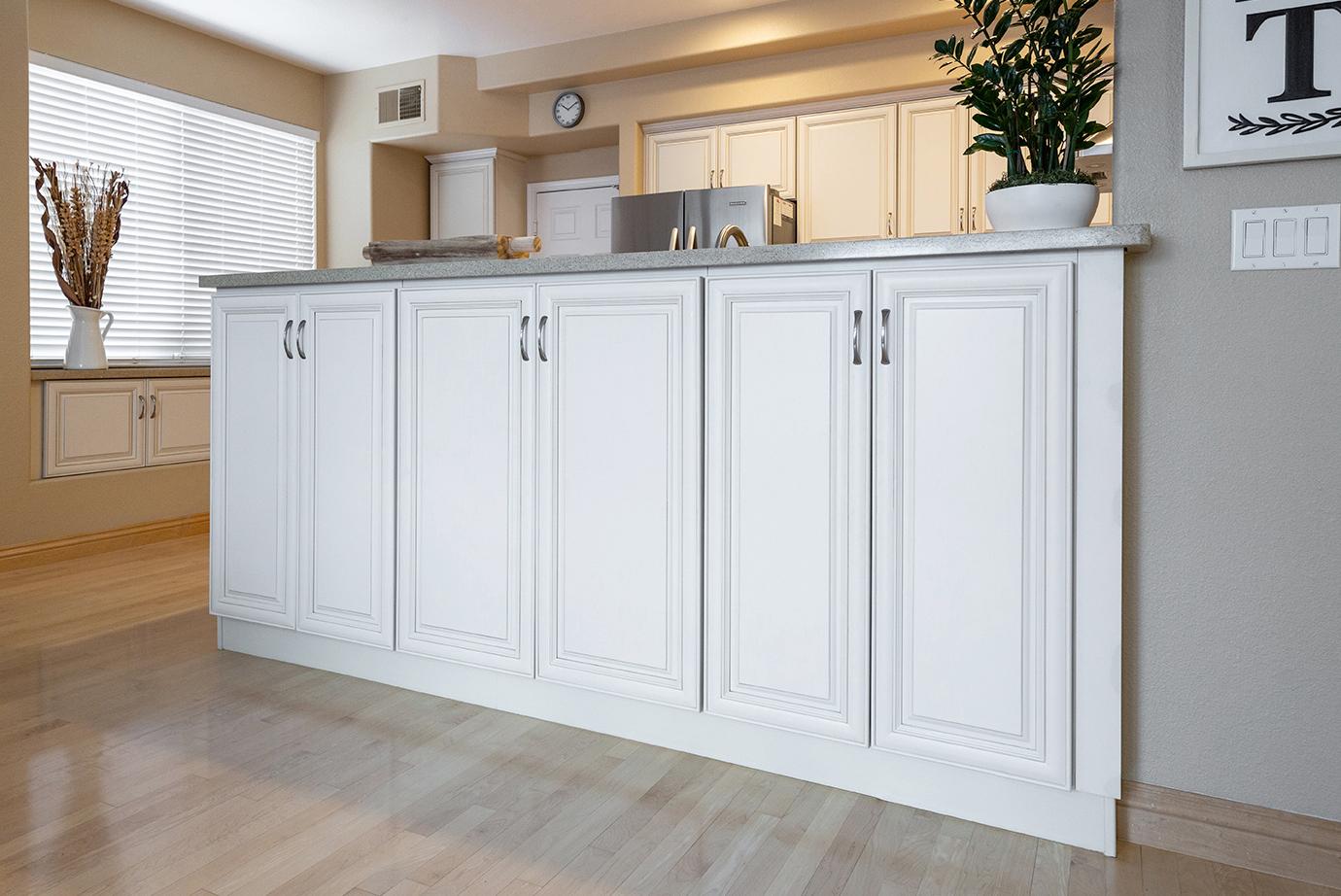 Storage cabinets added below the kitchen bar